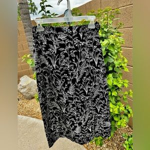 Never worn, new, Disturbia mock wrap floral printed skirt.